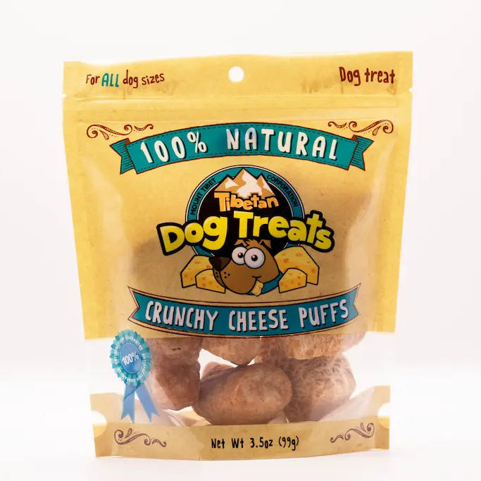 Package of '100% Natural Dog Treats Crunchy Cheese Puffs' on a white background